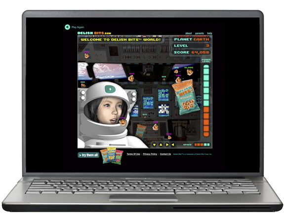 Image of a computer screen displaying a scene from a space-themed game that features Delish Bits snacks.