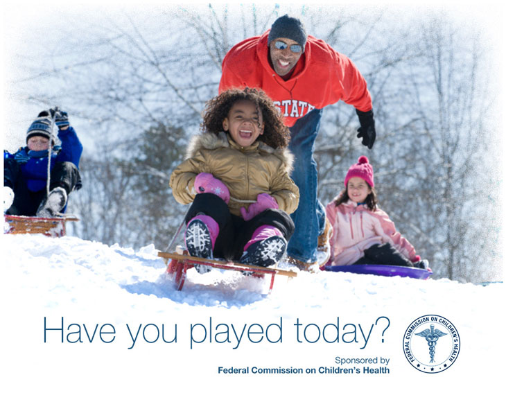 Image of an outdoor billboard public service announcement displaying a photo of adults and kids sledding, the Federal Commission on Childrens Healths logo, and the words, 'Have you played today?'