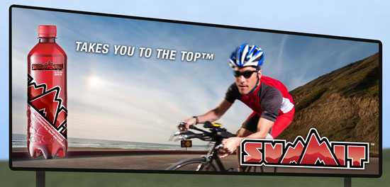 Image of a screen shot from a fast-paced racing game showing a track with a Summit Soda billboard along the side.