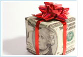 money in the shape of a present with a bow